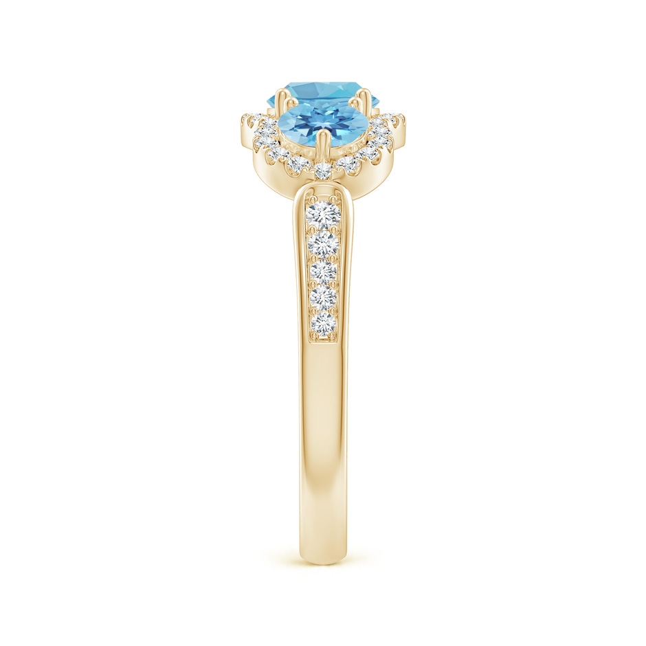 5mm A Floating Three Stone Swiss Blue Topaz Ring with Diamond Halo in Yellow Gold side 299