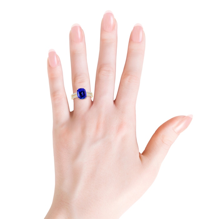 10x8mm AAAA Cushion Tanzanite Split Shank Ring with Diamond Accents in Yellow Gold Body-Hand