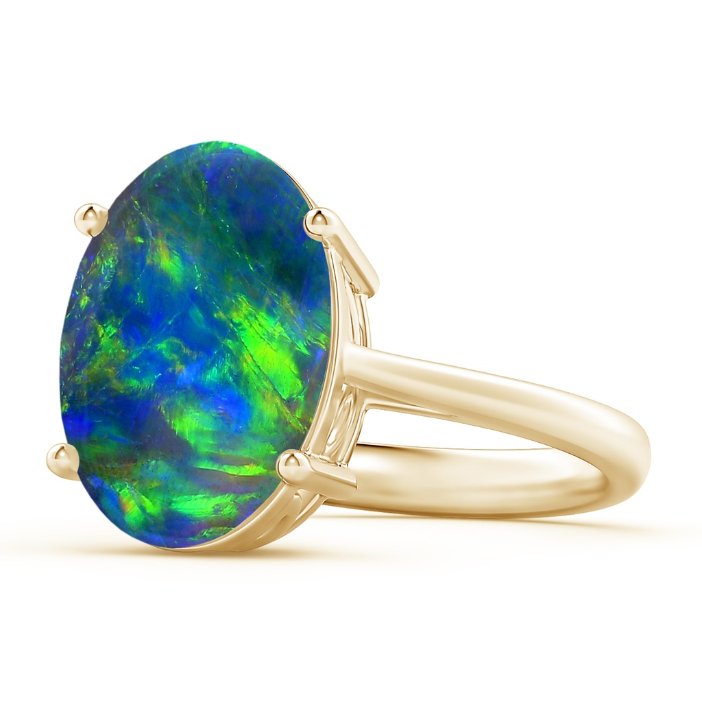 12.25x9.70x3.09mm AA Oval Solitaire Black Opal Cocktail Ring in Yellow Gold