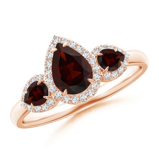 7x5mm A Claw-Set Pear Garnet Three Stone Ring with Diamond Halo in Rose Gold