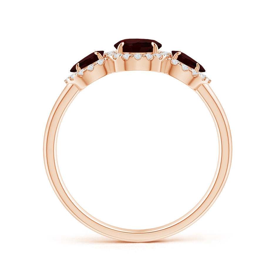 7x5mm A Claw-Set Pear Garnet Three Stone Ring with Diamond Halo in Rose Gold product image