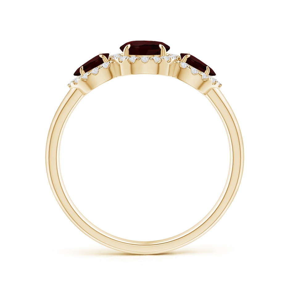 7x5mm A Claw-Set Pear Garnet Three Stone Ring with Diamond Halo in Yellow Gold product image