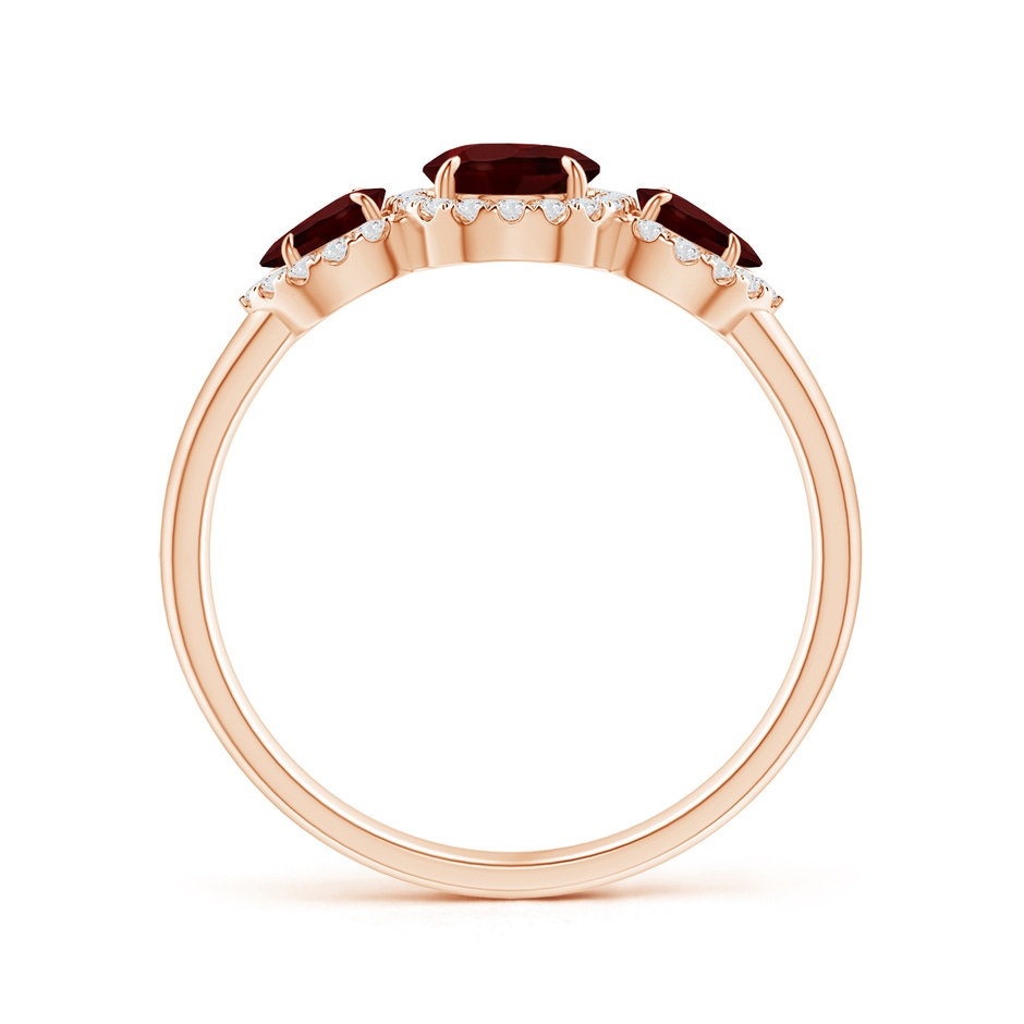 7x5mm AA Claw-Set Pear Garnet Three Stone Ring with Diamond Halo in Rose Gold product image