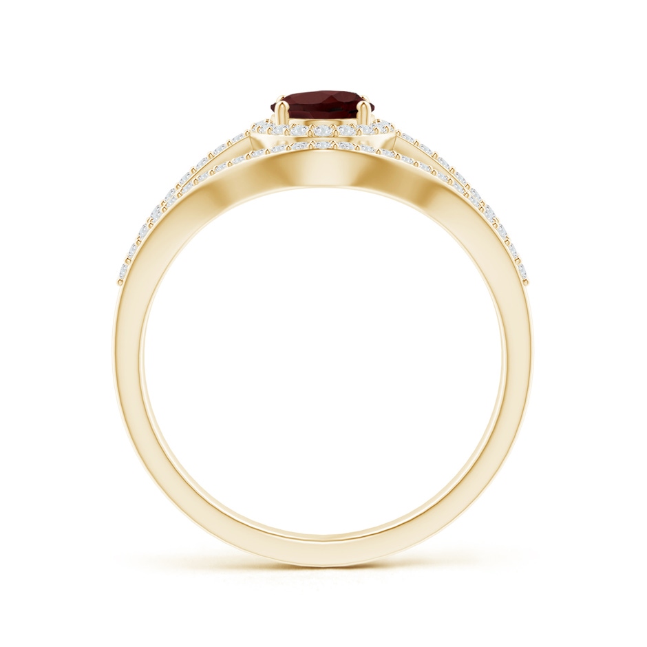 7x5mm AA Triple Shank Oval Garnet and Diamond Halo Ring in Yellow Gold product image