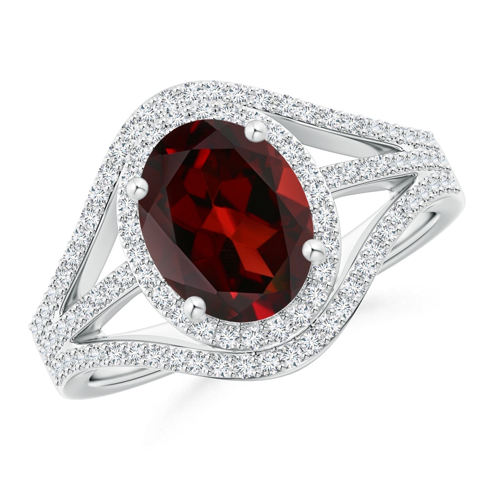 9x7mm AAA Triple Shank Oval Garnet and Diamond Halo Ring in White Gold