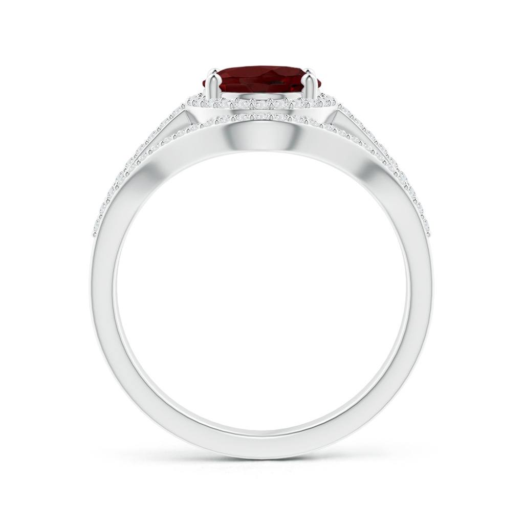 9x7mm AAA Triple Shank Oval Garnet and Diamond Halo Ring in White Gold Product Image