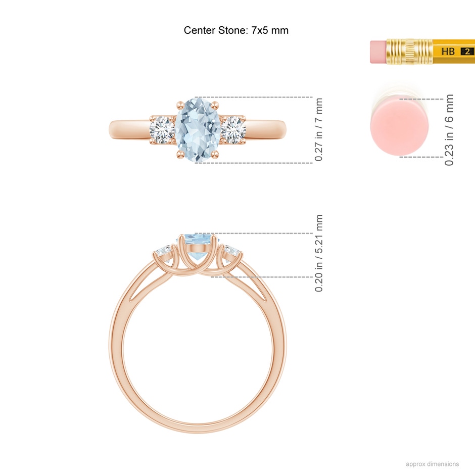 7x5mm A Oval Aquamarine and Round Diamond Three Stone Ring in Rose Gold ruler