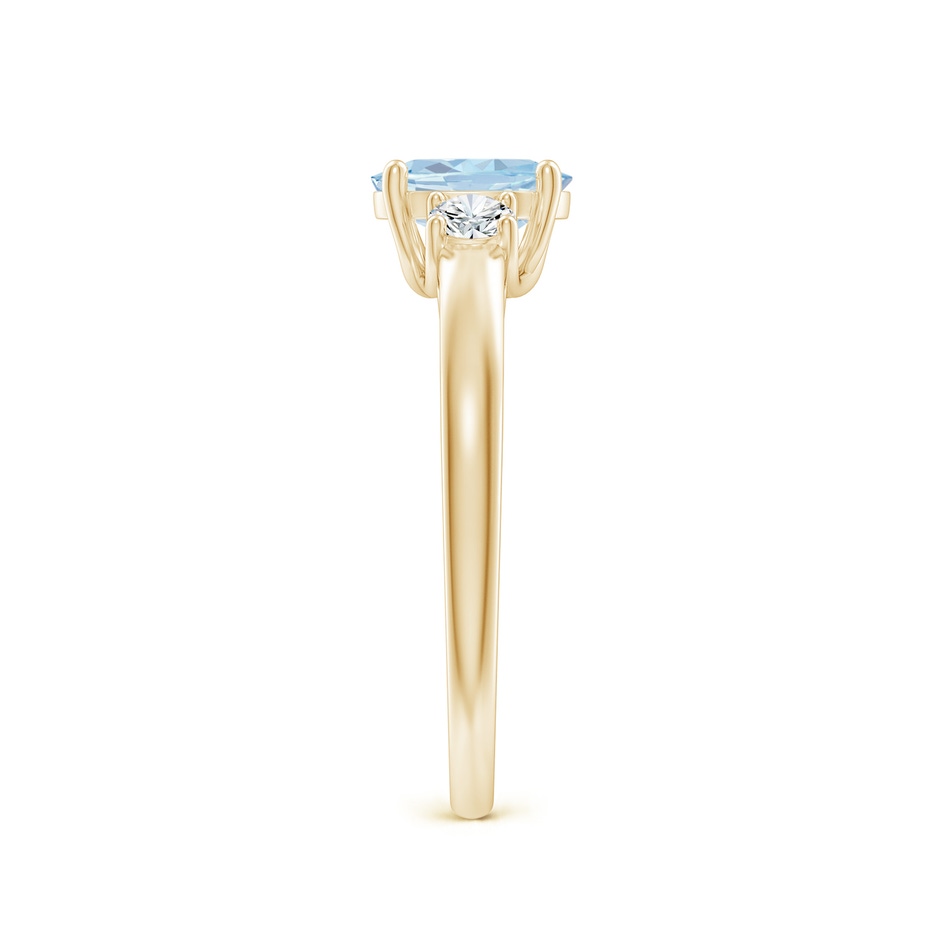 7x5mm A Oval Aquamarine and Round Diamond Three Stone Ring in Yellow Gold side-2