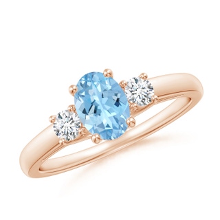 7x5mm AAAA Oval Aquamarine and Round Diamond Three Stone Ring in Rose Gold