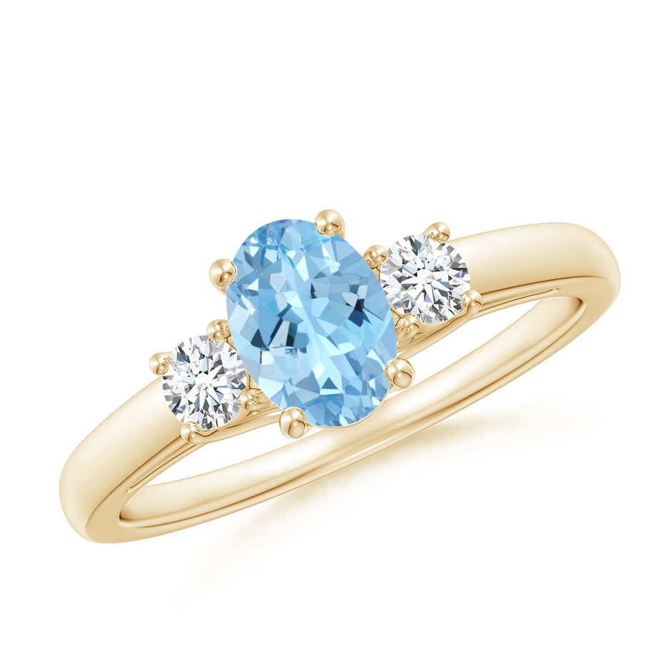 7x5mm AAAA Oval Aquamarine and Round Diamond Three Stone Ring in Yellow Gold 