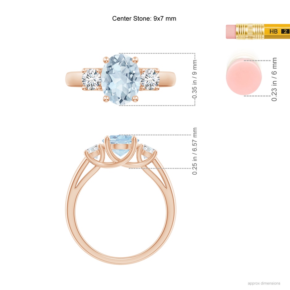 9x7mm A Oval Aquamarine and Round Diamond Three Stone Ring in Rose Gold ruler