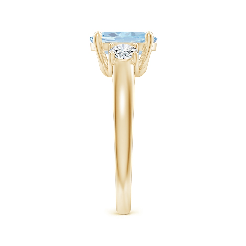 9x7mm A Oval Aquamarine and Round Diamond Three Stone Ring in Yellow Gold side-2