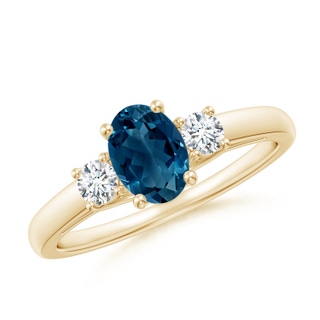 7x5mm AAAA Oval London Blue Topaz and Round Diamond Three Stone Ring in Yellow Gold
