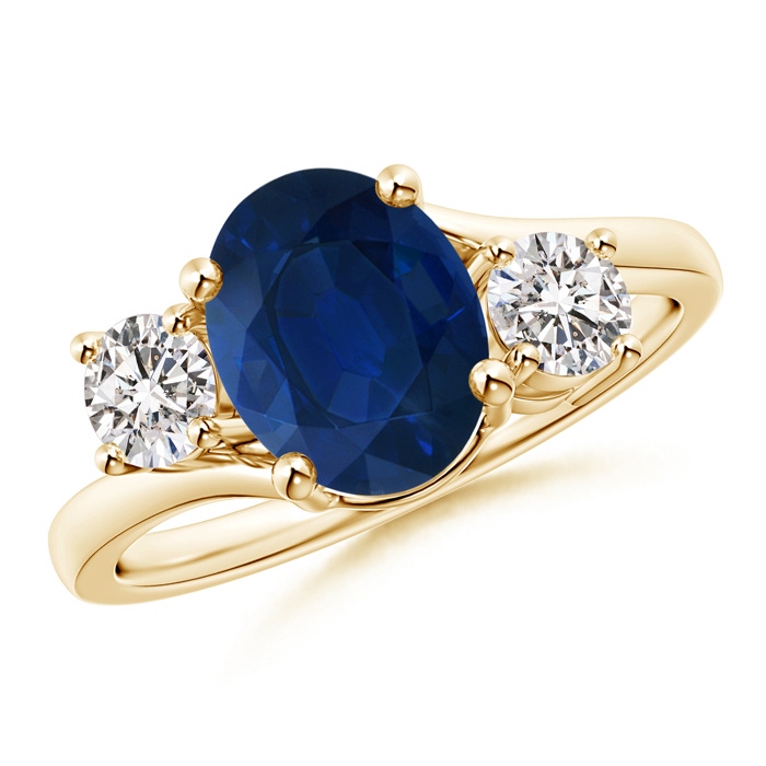 9x7mm AA Bypass Blue Sapphire and Diamond Three Stone Ring in Yellow Gold 