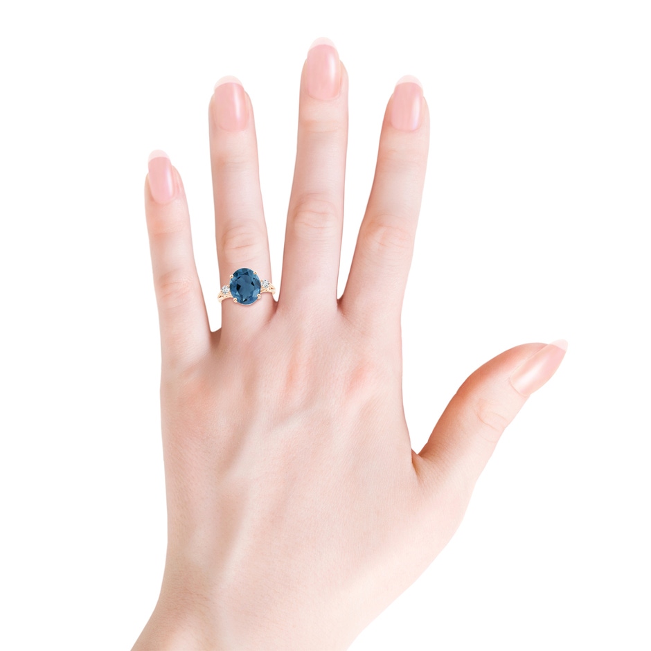 12x10mm A Oval London Blue Topaz Loop Shank Ring with Diamond Accents in Rose Gold product image