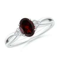 Solitaire Oval Garnet Split Shank Ring with Trio Diamonds