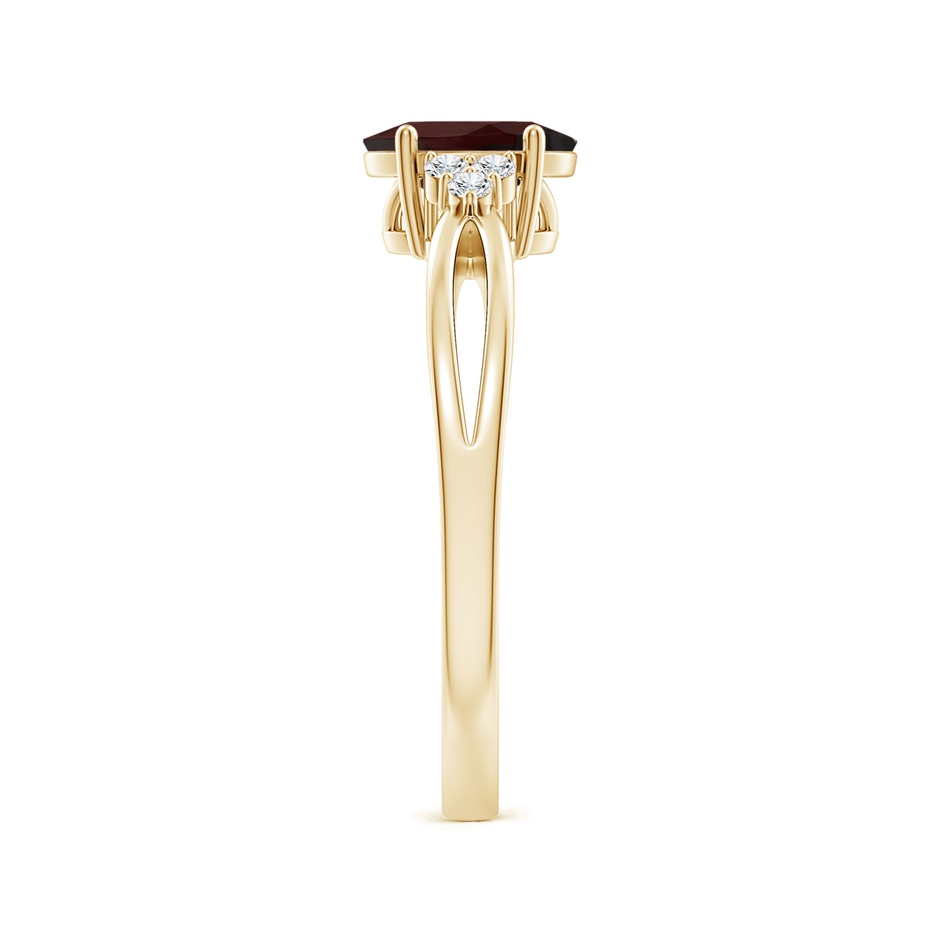 7x5mm A Solitaire Oval Garnet Split Shank Ring with Trio Diamonds in Yellow Gold side 299