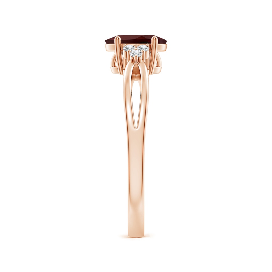 7x5mm AA Solitaire Oval Garnet Split Shank Ring with Trio Diamonds in Rose Gold side 299