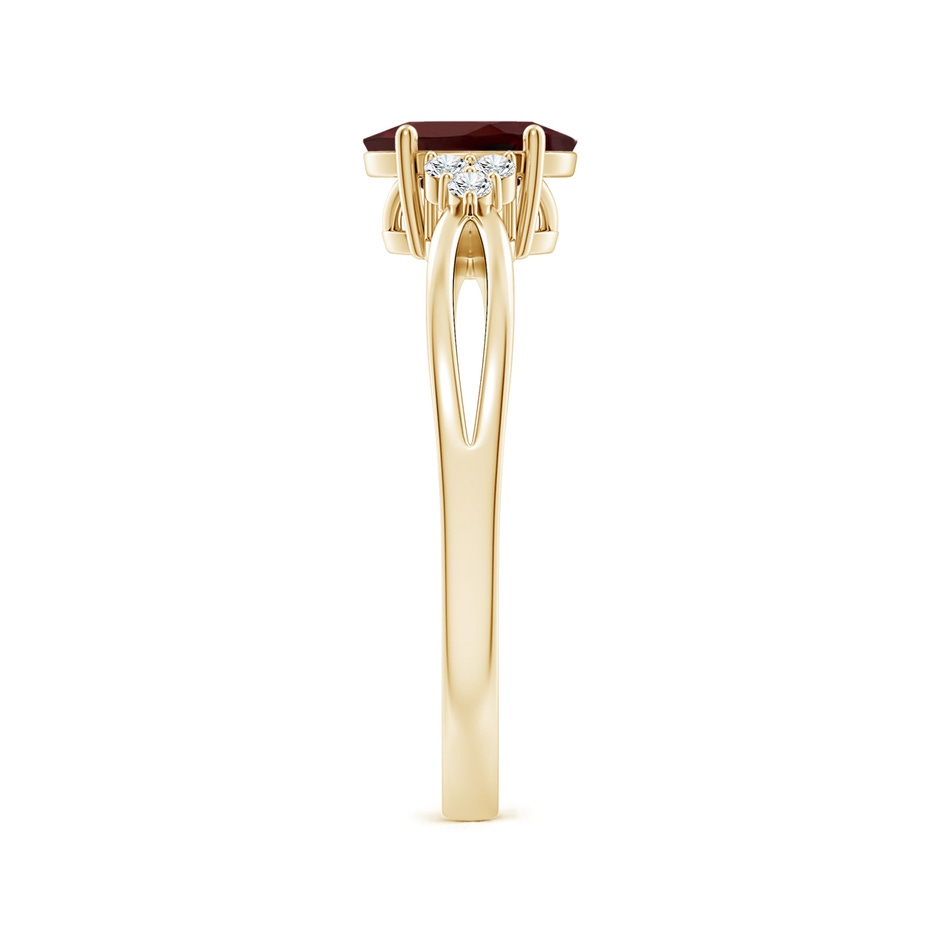 7x5mm AA Solitaire Oval Garnet Split Shank Ring with Trio Diamonds in Yellow Gold side 299