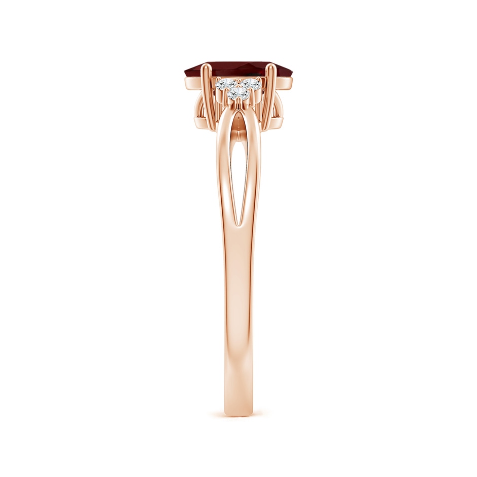7x5mm AAA Solitaire Oval Garnet Split Shank Ring with Trio Diamonds in Rose Gold side 299