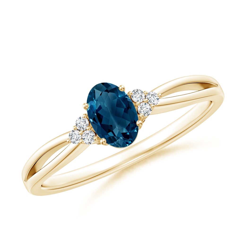 6x4mm AAAA Oval London Blue Topaz Split Shank Ring with Trio Diamonds in Yellow Gold