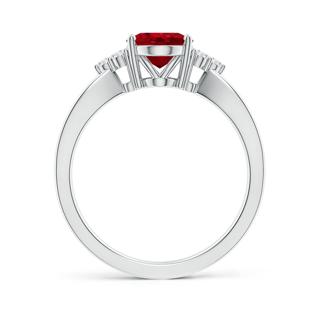 Solitaire Oval Ruby Split Shank Engagement Ring with Trio Diamonds