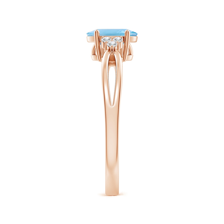 7x5mm A Oval Swiss Blue Topaz Split Shank Ring with Trio Diamonds in Rose Gold side 299