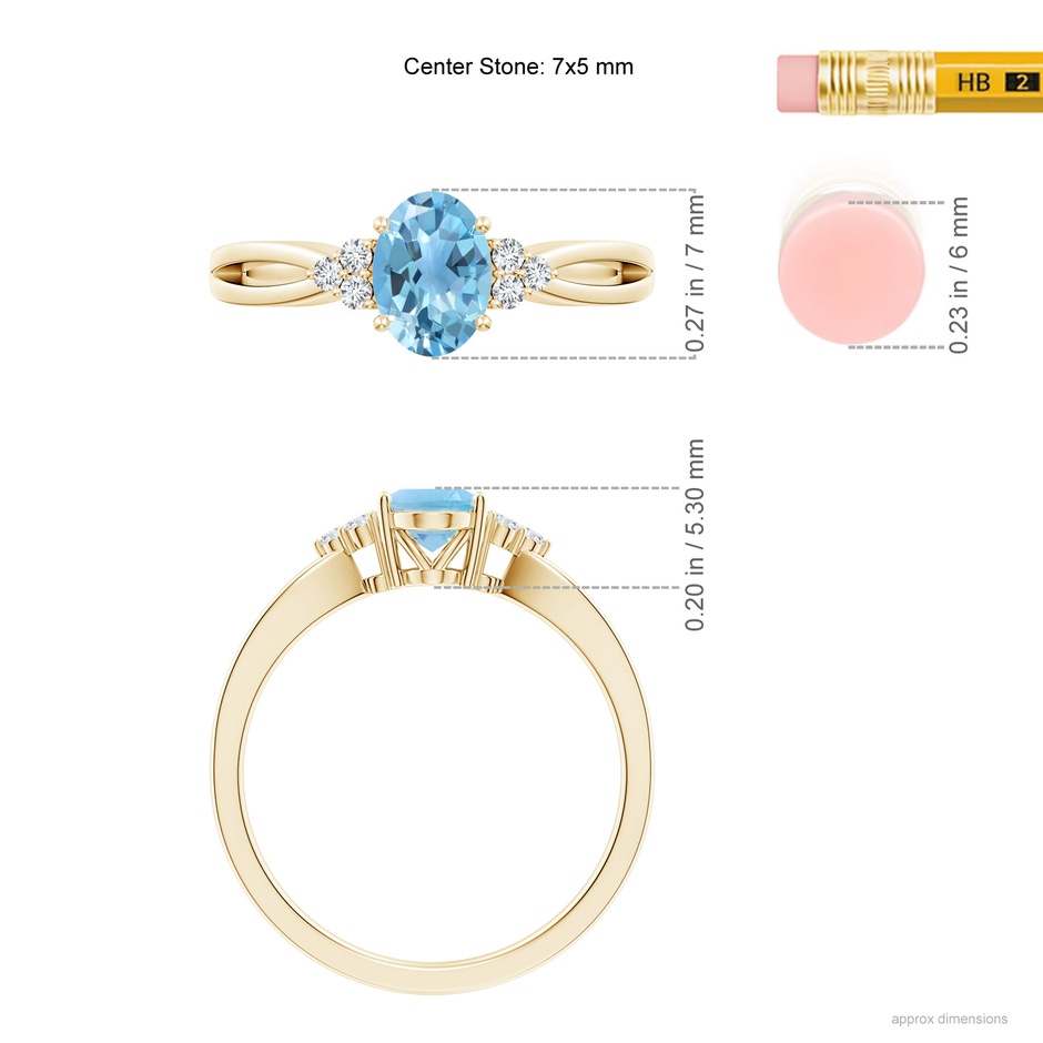 7x5mm A Oval Swiss Blue Topaz Split Shank Ring with Trio Diamonds in Yellow Gold ruler