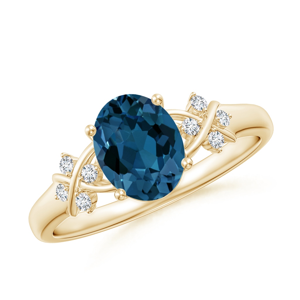 8x6mm AAA Oval London Blue Topaz Criss Cross Ring with Diamonds in Yellow Gold