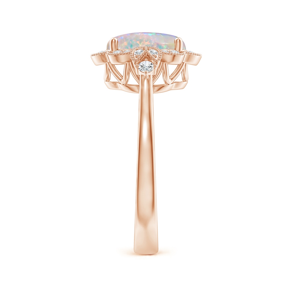 9x7mm AAAA Victorian Style Oval Opal and Diamond Halo Engagement Ring in 10K Rose Gold Body-Hand