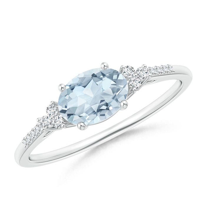 7x5mm A Horizontally Set Oval Aquamarine Solitaire Ring with Trio Diamond Accents in White Gold 