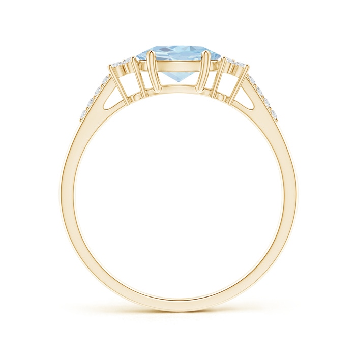 7x5mm A Horizontally Set Oval Aquamarine Solitaire Ring with Trio Diamond Accents in Yellow Gold side-1