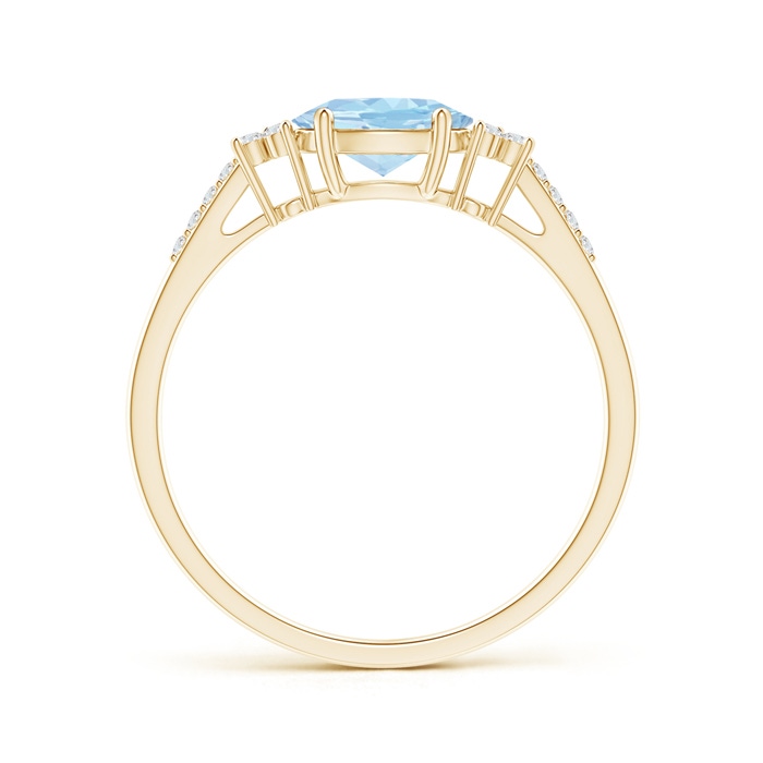 7x5mm AAA Horizontally Set Oval Aquamarine Solitaire Ring with Trio Diamond Accents in 10K Yellow Gold product image