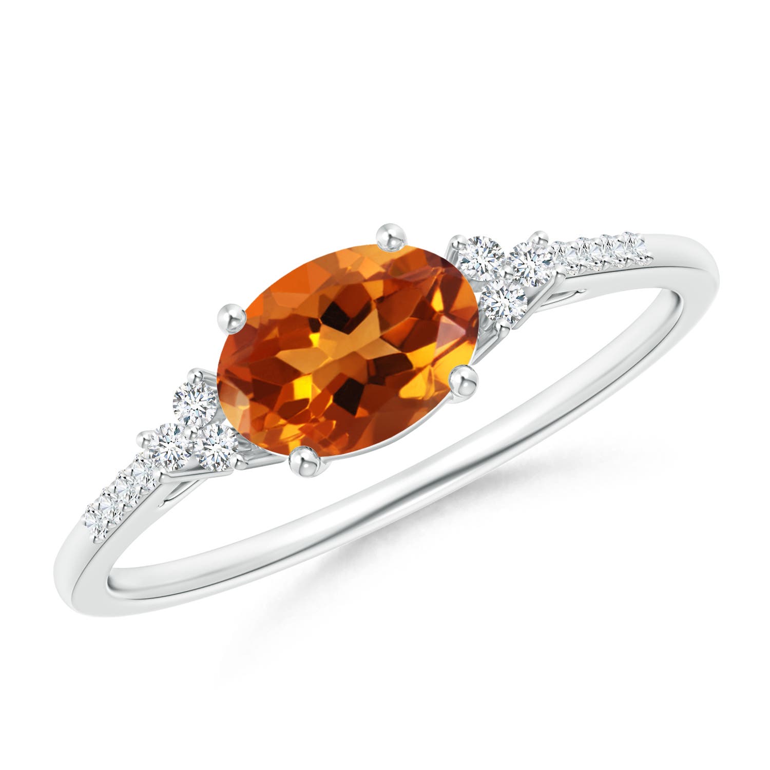 7x5mm AAAA Horizontally Set Oval Citrine Ring with Trio Diamonds in 18CT White Gold