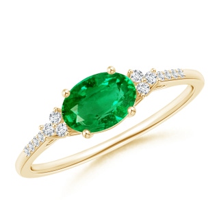7x5mm AAA Horizontally Set Oval Emerald Solitaire Ring with Trio Diamond Accents in Yellow Gold