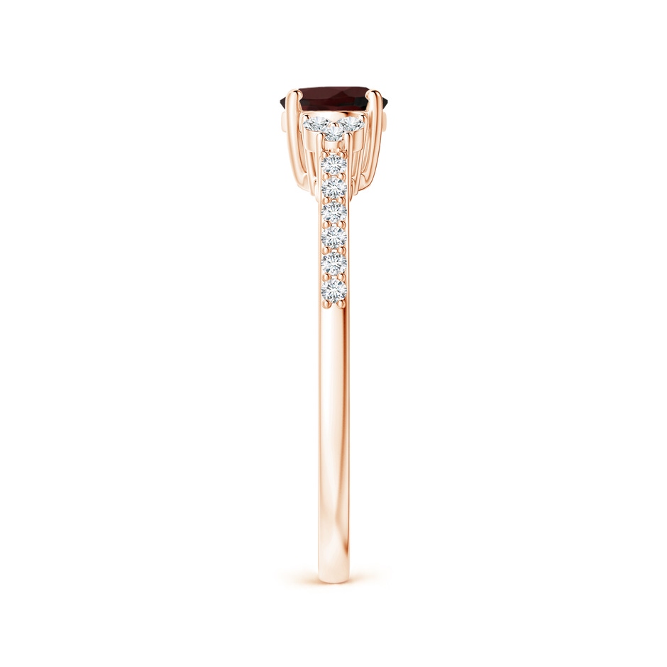7x5mm A Horizontally Set Oval Garnet Solitaire Ring with Trio Diamond Accents in Rose Gold side-2