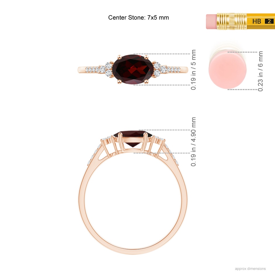 7x5mm A Horizontally Set Oval Garnet Solitaire Ring with Trio Diamond Accents in Rose Gold ruler