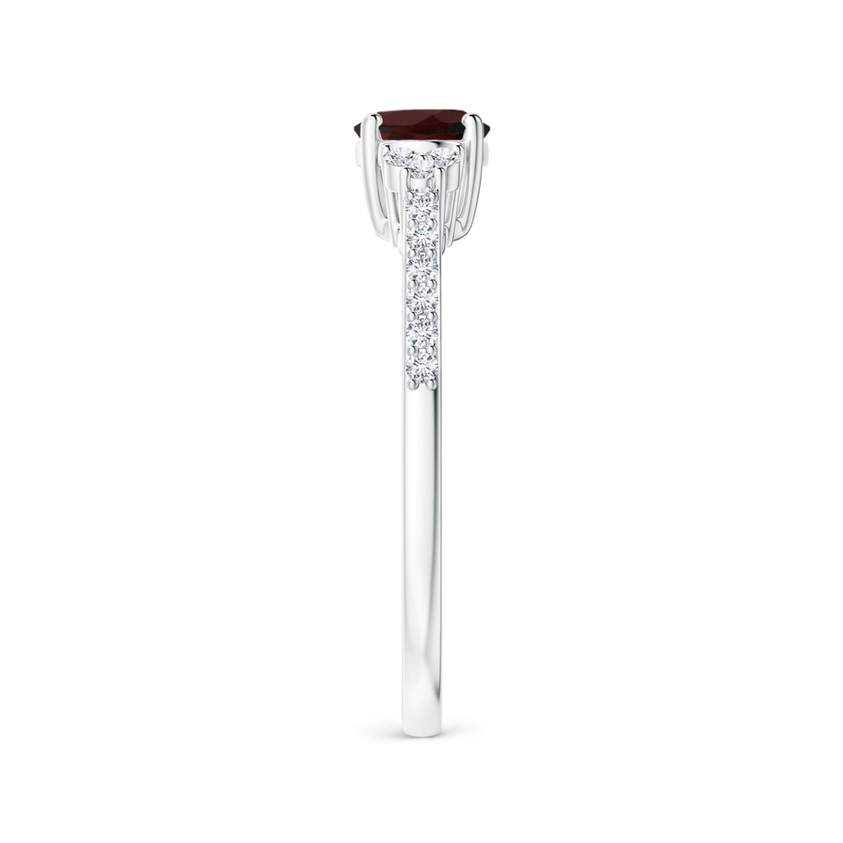 7x5mm A Horizontally Set Oval Garnet Solitaire Ring with Trio Diamond Accents in White Gold side-2
