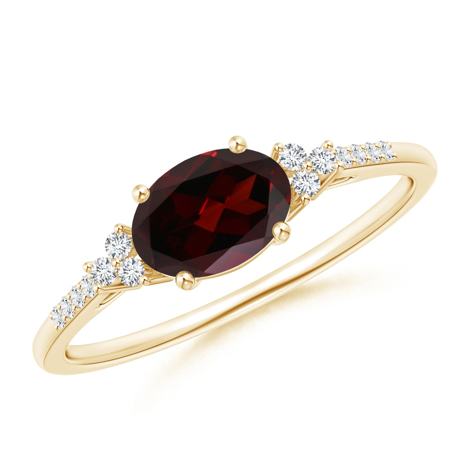 7x5mm A Horizontally Set Oval Garnet Solitaire Ring with Trio Diamond Accents in Yellow Gold 