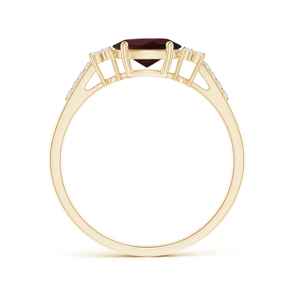 7x5mm A Horizontally Set Oval Garnet Solitaire Ring with Trio Diamond Accents in Yellow Gold side-1