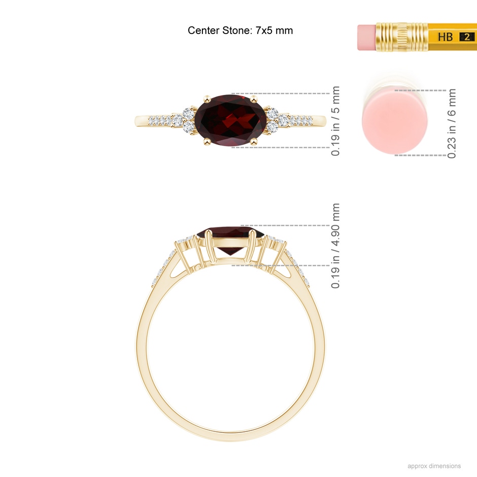 7x5mm A Horizontally Set Oval Garnet Solitaire Ring with Trio Diamond Accents in Yellow Gold ruler