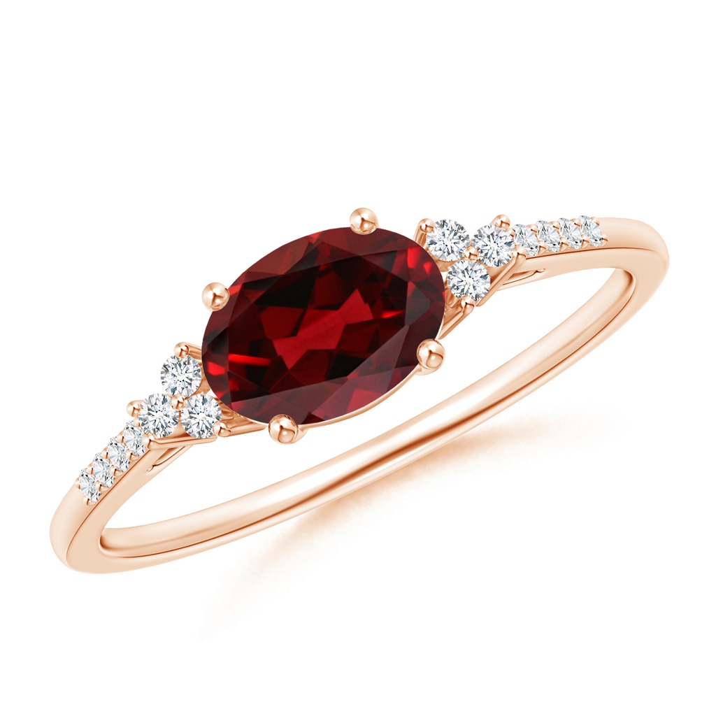 7x5mm AAAA Horizontally Set Oval Garnet Solitaire Ring with Trio Diamond Accents in Rose Gold