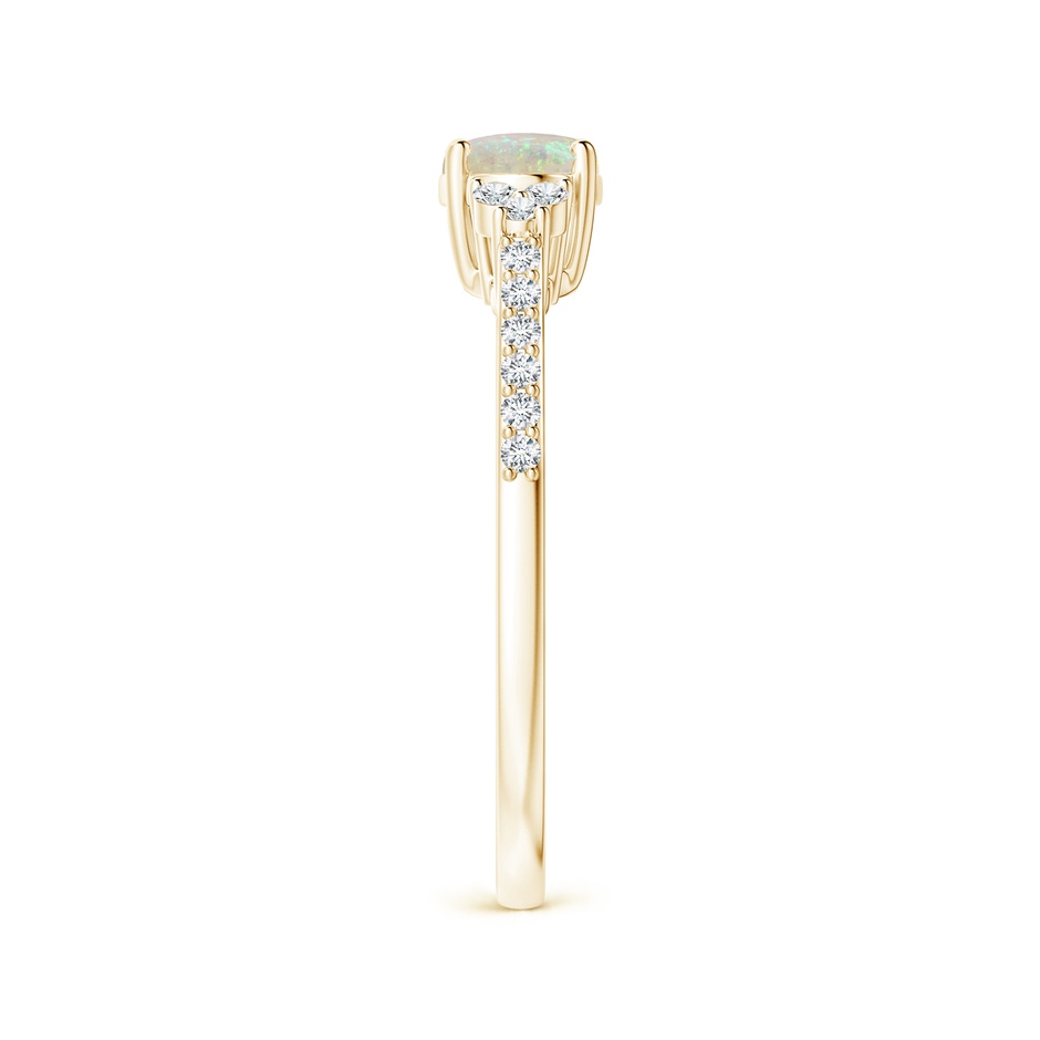 7x5mm AAA Horizontally Set Oval Opal Ring with Trio Diamonds in Yellow Gold side 299