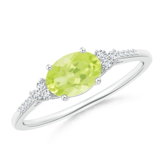 7x5mm A Horizontally Set Oval Peridot Solitaire Ring with Trio Diamond Accents in S999 Silver