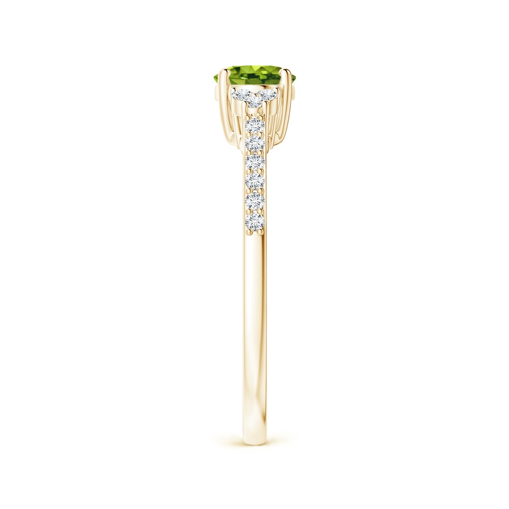 7x5mm AAAA Horizontally Set Oval Peridot Solitaire Ring with Trio Diamond Accents in Yellow Gold Side-2