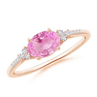 7x5mm A Horizontally Set Oval Pink Sapphire Solitaire Ring with Trio Diamond Accents in Rose Gold