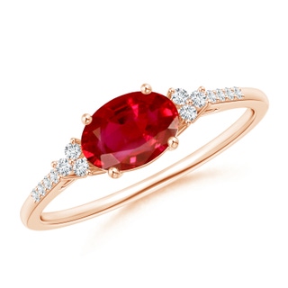 7x5mm AAA Horizontally Set Oval Ruby Solitaire Ring with Trio Diamond Accents in Rose Gold