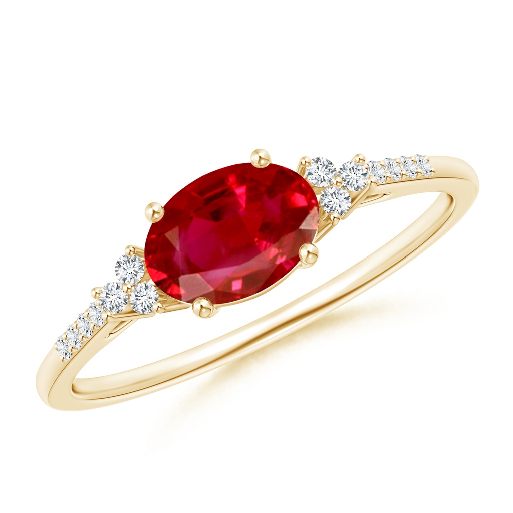 7x5mm AAA Horizontally Set Oval Ruby Solitaire Ring with Trio Diamond Accents in Yellow Gold