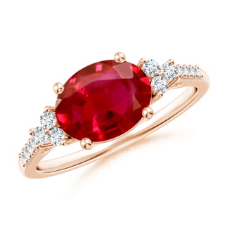 9x7mm AAA Horizontally Set Oval Ruby Solitaire Ring with Trio Diamond Accents in Rose Gold