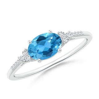 7x5mm AAA Horizontally Set Oval Swiss Blue Topaz Ring with Trio Diamonds in 9K White Gold